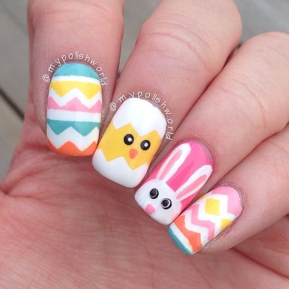 35 Cute and Easy Easter Nail Designs for 2019; bunny nails; cute nails; easy nails; short nails; flowers nails; fuzzy animals nails. Easter is all about flowers, fuzzy animals, candy and pastels. And all of these things you can painting nails, which would look amazing.