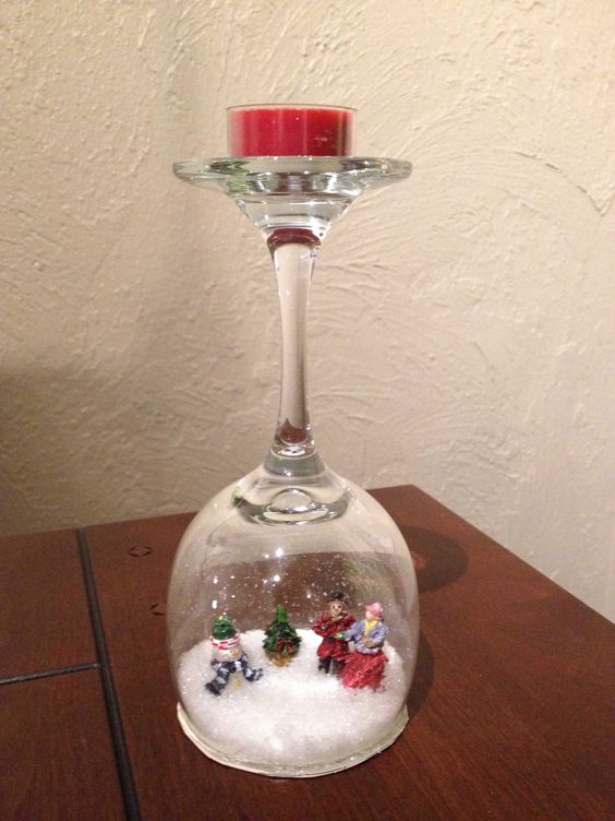 Christmas wine glass candle holder ; DIY Home Decor Ideas; beautiful Christmas decor; Christmas wine glass snow globe; cheap and easy candle holders.