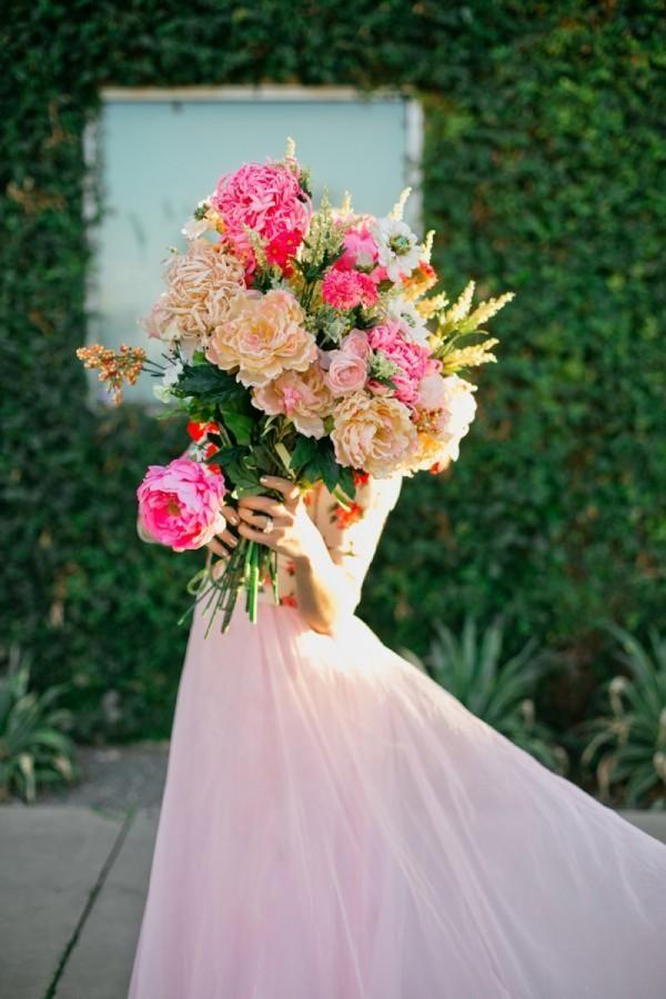 Holding flowers! There is always one that you like! #wedding #flowers